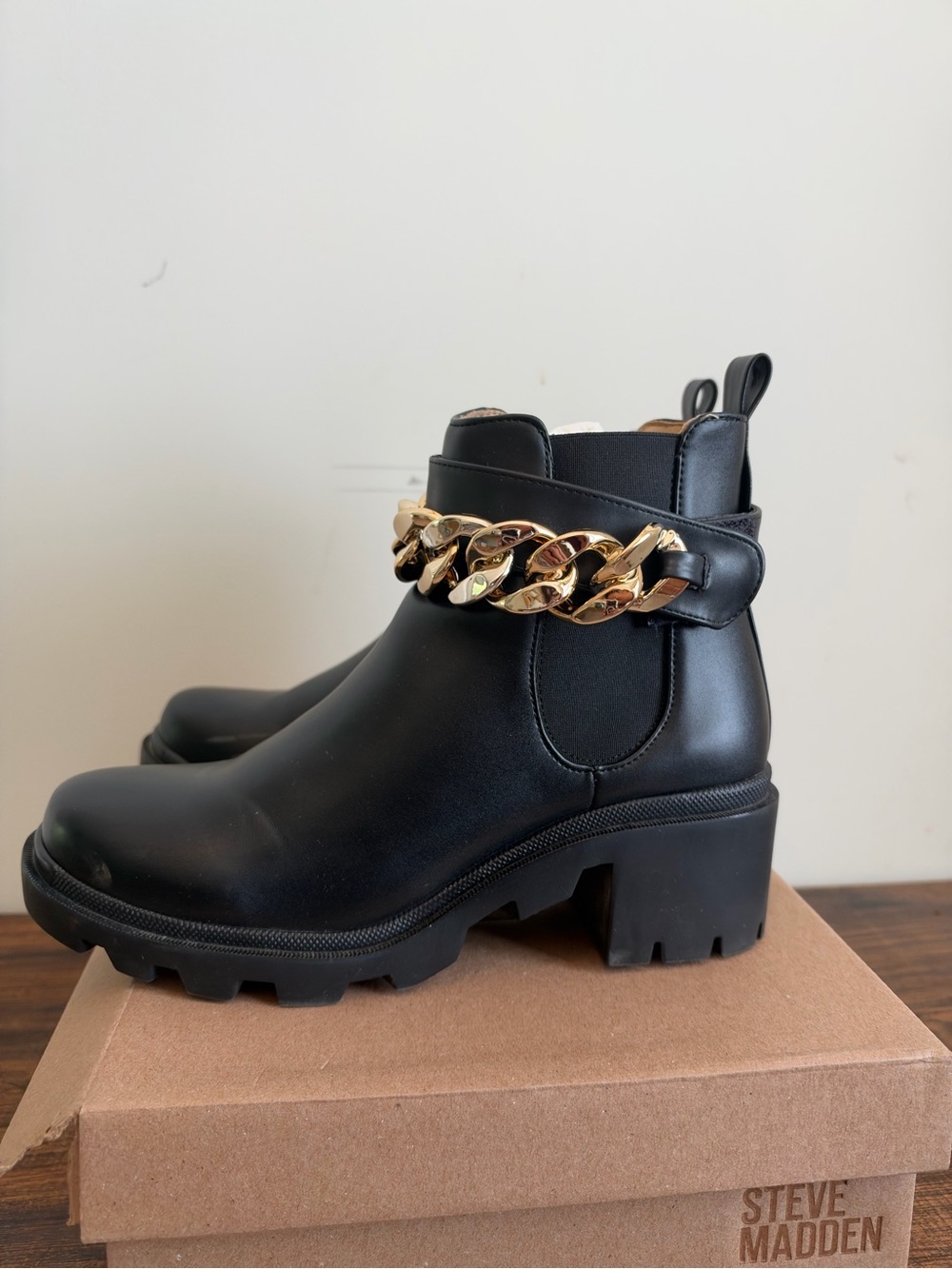 Steve Madden Black Chelsea Booties with Gold Chain Accent